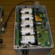 April 2010. Master modem box houses the NiMH batteries, the charger (lower right), and the modem module (upper right).
